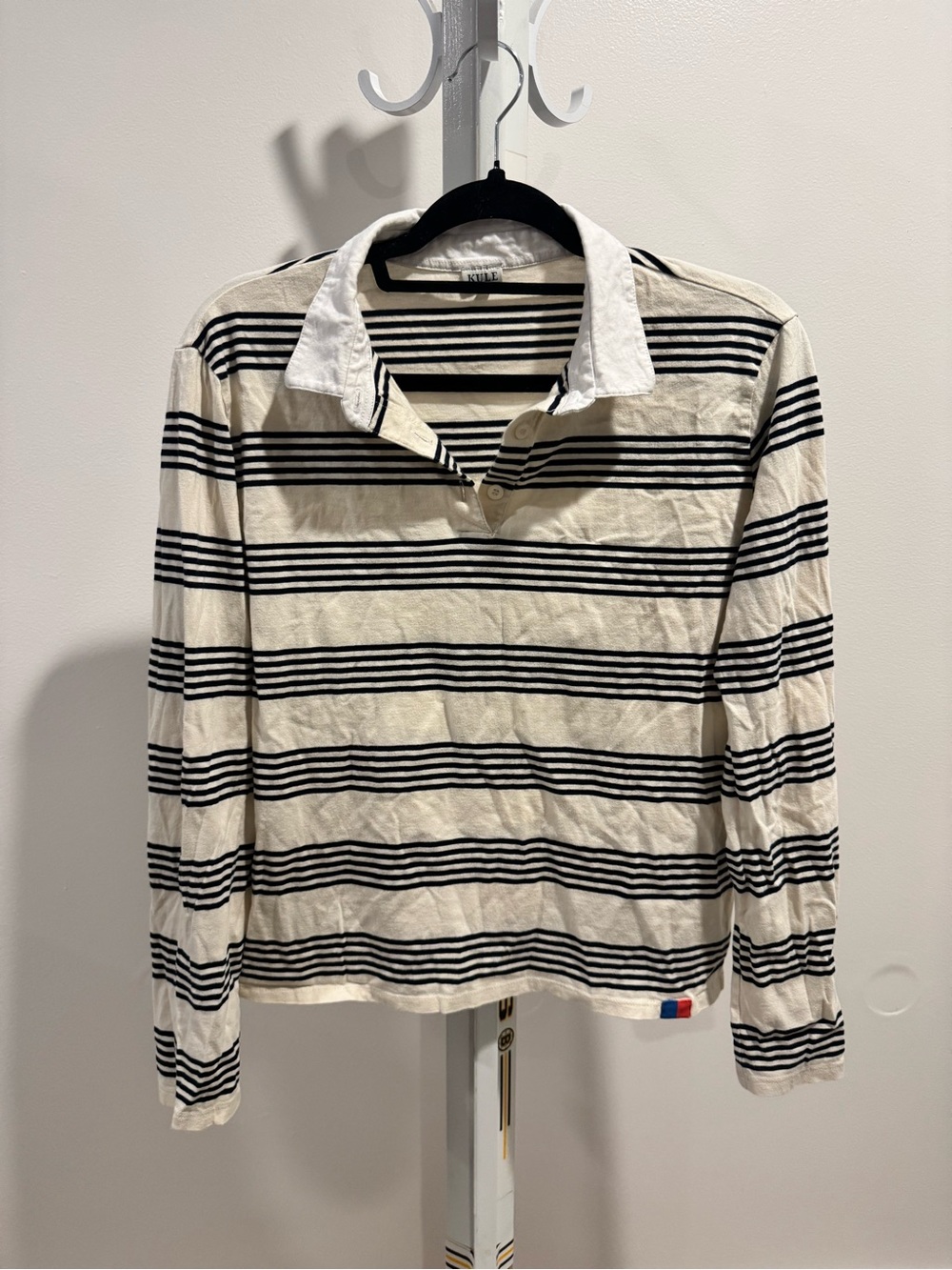 KULE Cream and Black Striped Long-Sleeve Polo